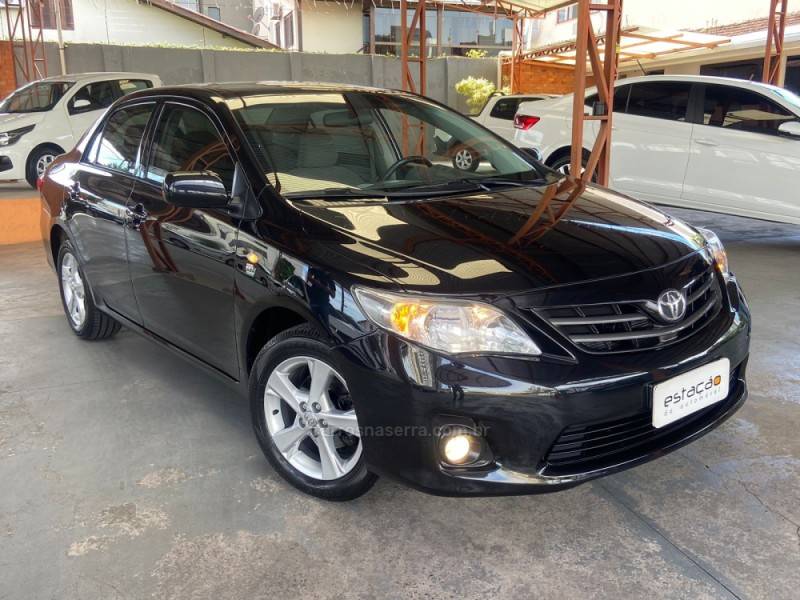 TOYOTA - COROLLA - 2013/2014 - Preta - R$ 66.900,00